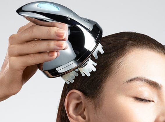 ReFa Head and Scalp Massager in Use